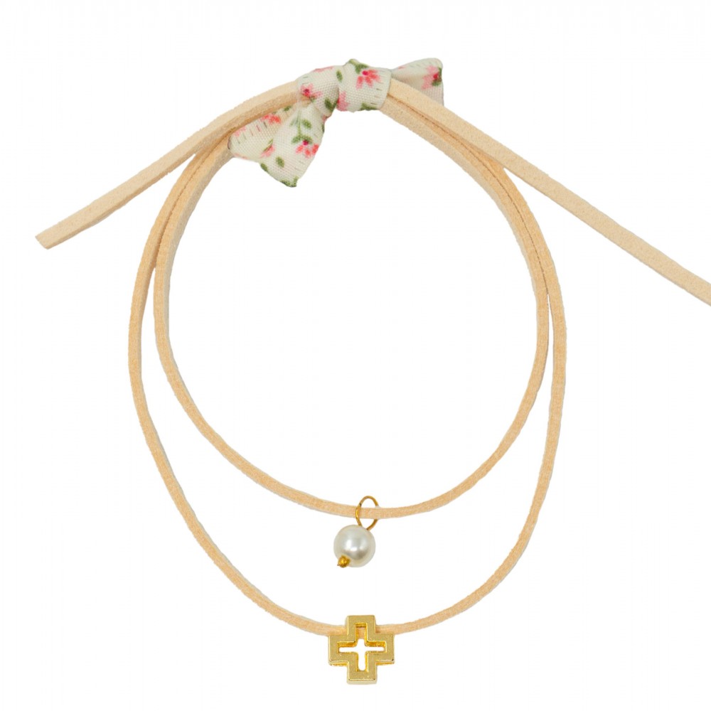 Baptism certificate in the shape of a bracelet decorated with a pearl, a gold cross and a bow.